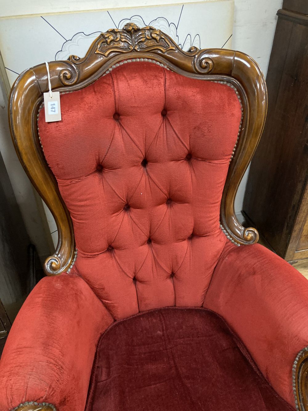 A reproduction Victorian style armchair